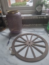 Pink Lantern With Gold Handle  And Hanging Wagon Wheel Wood Can Be Center Piece.