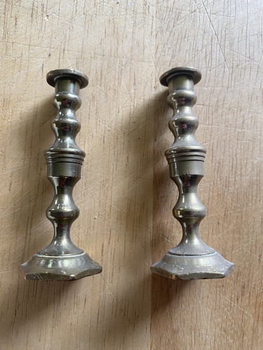 Two small brass candle sticks - sticks,