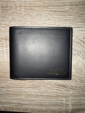 Gucci Gold Print Logo Leather