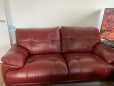 Burgundy 2 seater sofa in