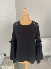 Marks & Spencer black bell