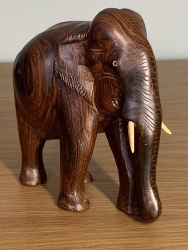 Hand carved wooden elephants - hand,
