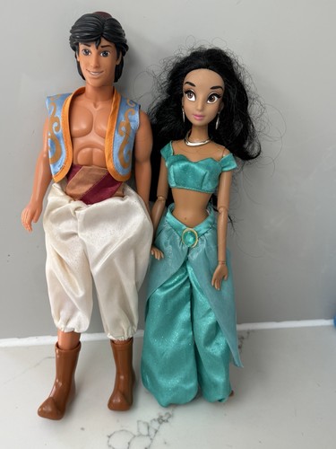 Aladdin and jasmine dolls - and,