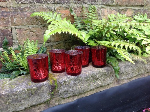 Twelve red mercury votive