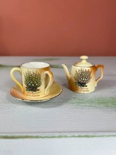 Set of souvenir miniatures - cup, saucer & teapot