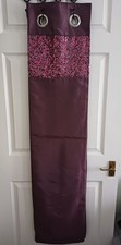 Burgundy drape curtains from