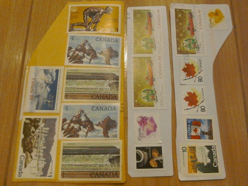 Canadian stamps on paper - x,