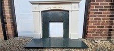 Cream fireplace surround with