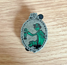 DISNEY  HAUNTED MANSION CARETAKER AND DOG GLOW IN THE DARK MYSTERY PIN