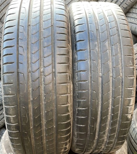 Matching pair 215 55 18 - x2, of
