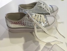 CLAUDIA GHIZZANI Designer