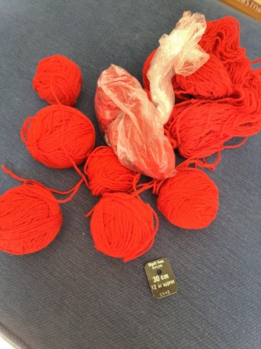Red wool oddments about - oddments,