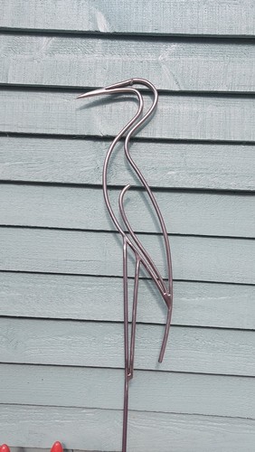 Heron garden sculpture hand