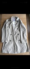 Classic beige trench coat from