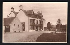 Tomatin near Inverness. Freeburn Hotel. Deck Chairs.