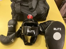 Blitz Karate Sparring Kit. New. Helmet, Mitts, Gloves, Bag. Child’s Size Medium