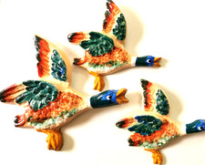 Flying ducks plaster wall