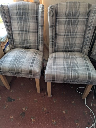 Two dining chairs next - -,