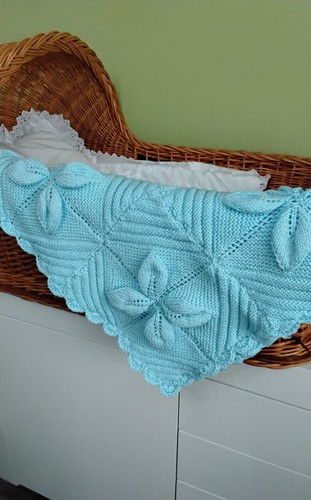 Hand knitted baby - hand,