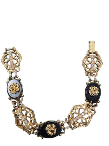 Vintage gold and black cameo