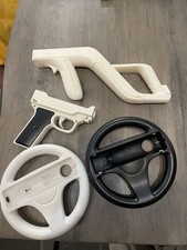 Nintendo Wii Bundle 2 Steering Wheel, and 2 Gun Accessories Attachments