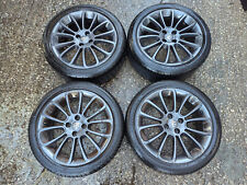 4x VAUXHALL ADAM 17" 7J ET44 4-STUD 14-SPOKE GREY ALLOY WHEELS & TYRES 215/45/17