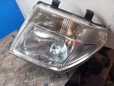 NISSAN NAVARA NS PASSENGER HEADLIGHT *LUG DAMAGE* 2008