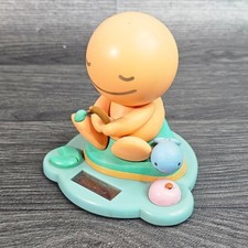 Tomy 2002 Solar Powered Smiling Figurine with Fish Toy Collectable