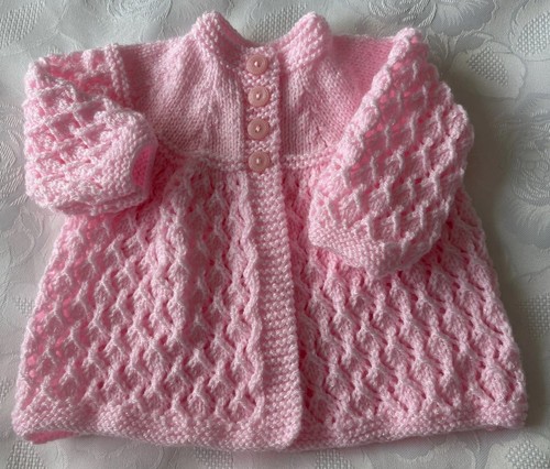 New hand knitted girl - hand, pink