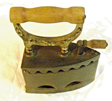 Antique Vintage Charcoal Coal Cast Iron Sad Iron Press Wood Handle. still usable