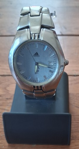 Adidas silver tone quartz - an,