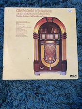 Old and gold jukebox - and,