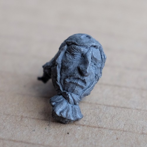 Giant head part with - part, tied