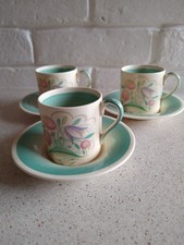 Susie Cooper Green Dresden Spray Coffee Cups and Saucers.