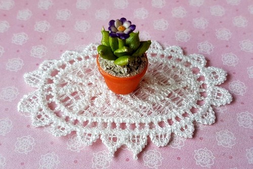 Oval intricate lace doily