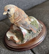 Teviotdale Sparrow on a Tin