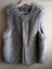 Top Shop faux fur gilet. Mid