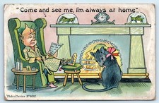 POSTCARD IMP SITTING BY FIRE
