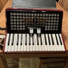 A Very Nice Rossini 80 Bass Piano Accordion  With Case and keys