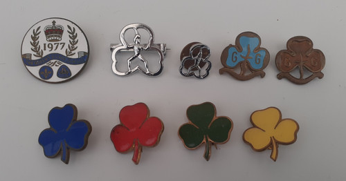 Vintage enamelled metal badges