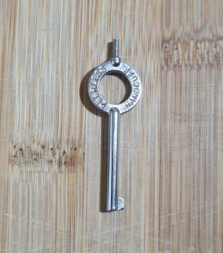 New peerless handcuff key - new,