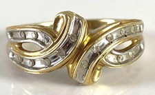 Stunning 10K Yellow and White Gold Diamond Twist Ring