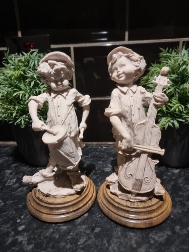 Armani figurines two scruffy - g,