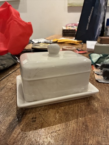 White butter dish with - butter, handle