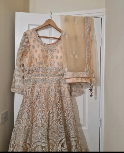 Rrp 300 heavy asian dress - £300,