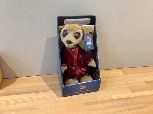 Compare the meerkat toy - ,