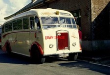 PHOTO  BUS ALBION FT39N REG NO LOD 495 CARMEL COACHES. OAKHAMPTON RAILWAY STATIO