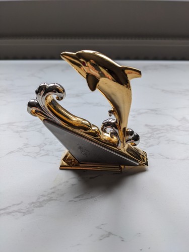 Beautiful brass dolphin - a,