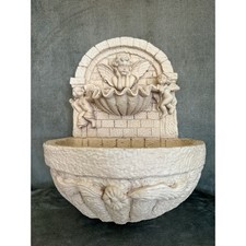 Wall mounted fountain cherubs