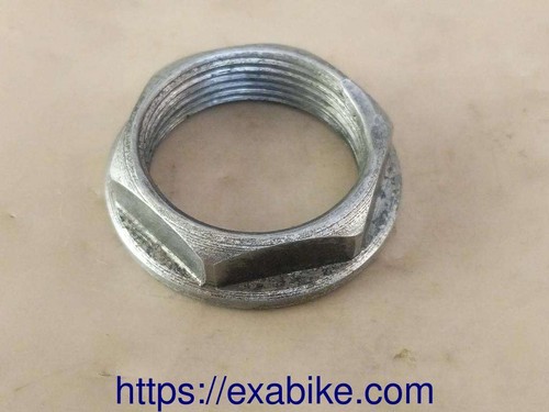 Front wheel axle nut - axle,